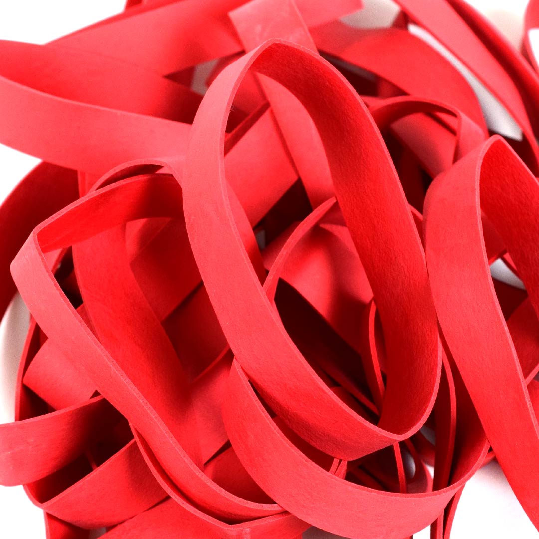Red rubber bands isolated on white Stock Photo by ©CreativeFamily 161026098