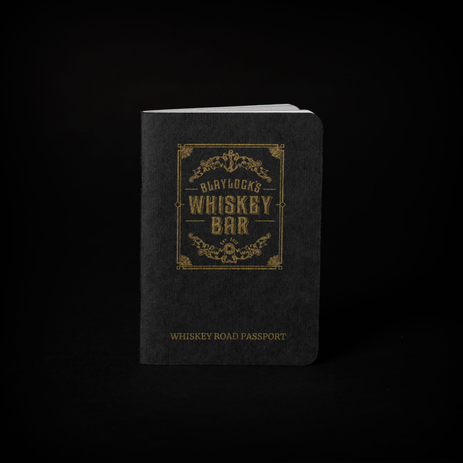 black Scout Book with ornate gold ink